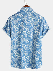 Short-sleeve shirt with tropical floral and leaf pattern, button-up