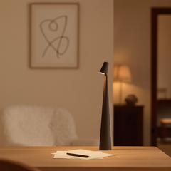 Compact wireless LED table lamp with brightness adjustment