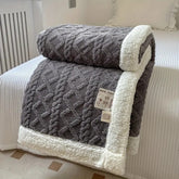 Warm thick plush Sherpa blanket for home relaxation