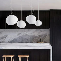 Artistic pendant lamp with frosted glass and pebbles for dining rooms and living rooms