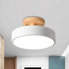 Warm Scandinavian round wooden LED ceiling lamp for modern interiors
