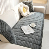 Thick plush sofa cover with pleated edges