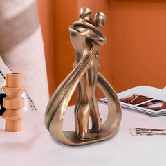 Decorative abstract sculpture depicting a couple embracing